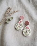Honeybee Garden Drops: white teardrop earrings with a bee and pink flowers